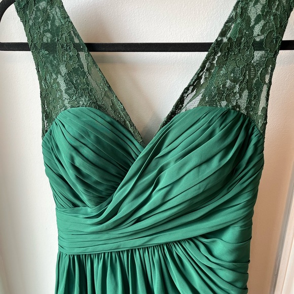 Green formal gown 60” long with ruched skirt. Size 10 but fits like a size 6. - Picture 2 of 6